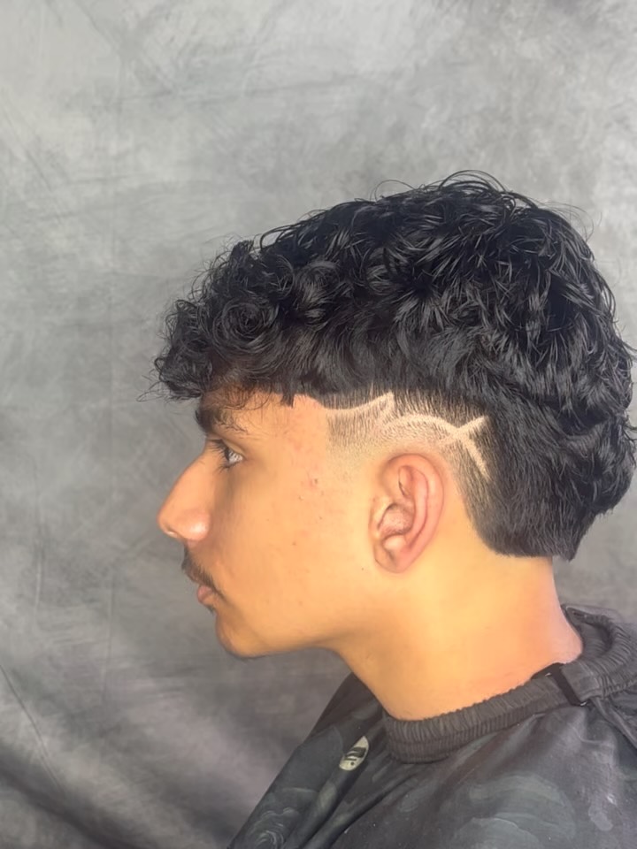 Custom shaved design fade by RD Cutz